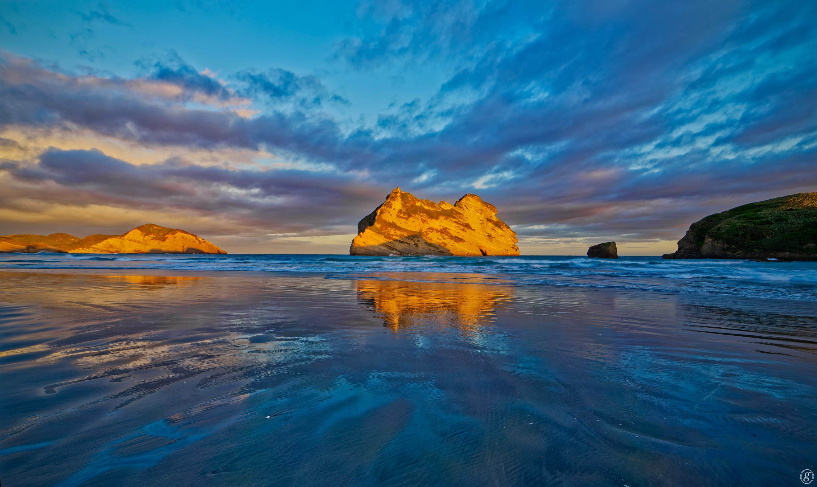 Sea stacks off Wharariki Beach, New Zealand